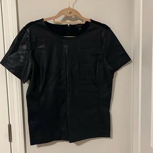 Ann Taylor navy fake leather front short sleeve top in size Medium